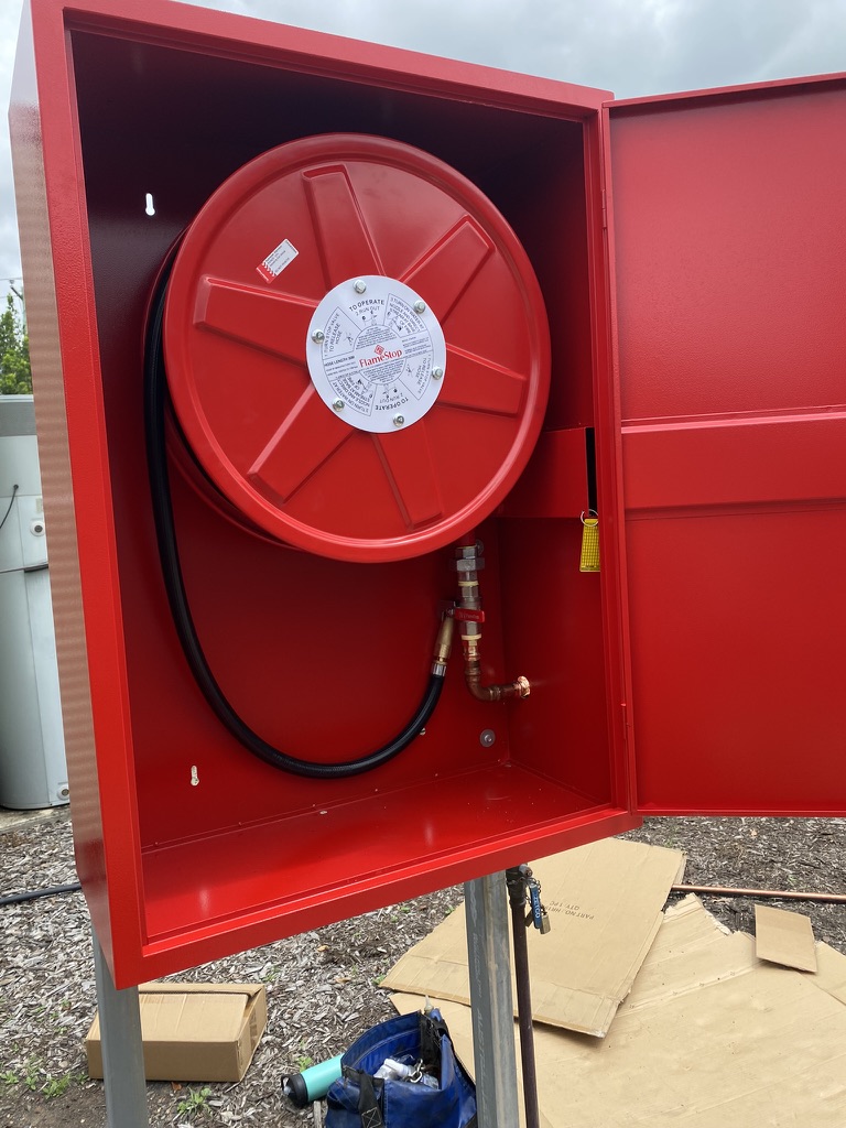 Fire hose reel cabinet installation at Thiess Accommodation Camp in Dysart